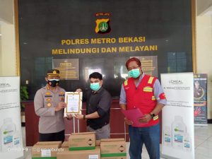 LOREAL BAGIKAN 5000 HAND SANITIZER UNTUK POLRI, TNI DAN JURNALIS KABUPATEN BEKASI