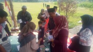 Kapala Desa Berbagi Kasih Dengan Yatim Piatu Se Desa Pasar Sari