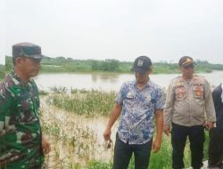 Muspika Pebayuran Pantau Ketinggian Debit Air Sungai Citarum, Mengantisipasi Bencana Banjir