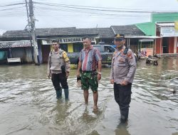 Kapolsek Sukatani lakukan Pengecekan Genangan Air di Wilayah Desa Suka Jadi