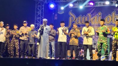 Doakan Ekonomi Indonesia Segera Bangkit,Ahmad bin Olim Bersama Ribuan Warga Lakukan Pawai Obor